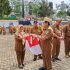 Sekda Tanggamus Pimpin Apel Pagi dan Pencanangan Gerakan Pembagian Bendera Merah Putih Tahun 2026